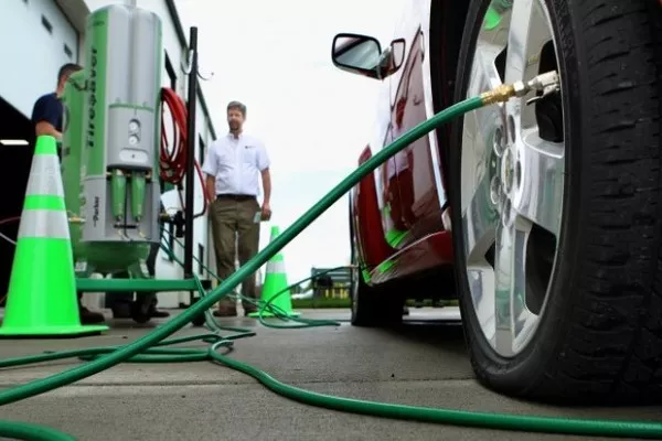 Car tire being filled with nitrogen