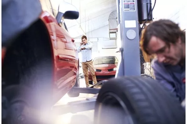 Man changing car tires