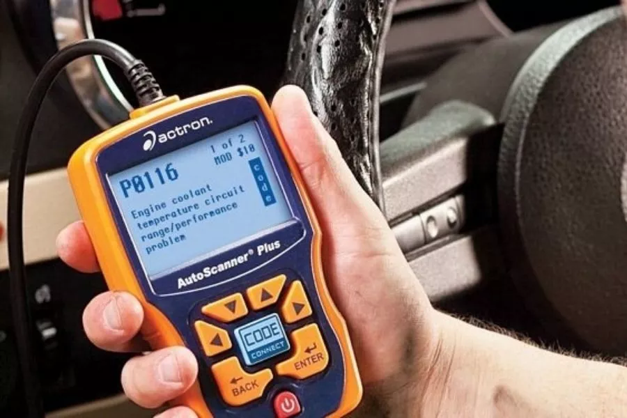A picture of an OBD-II being used