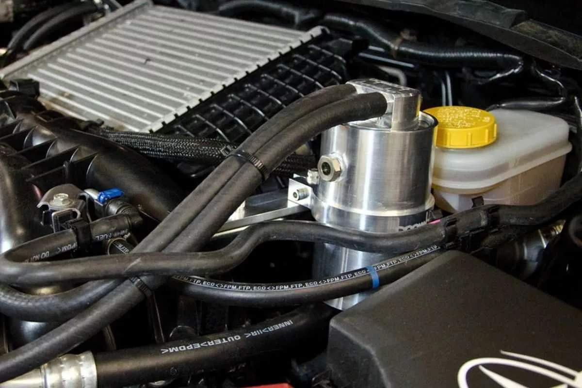 A picture of a high-end oil catch can from Boomba Racing