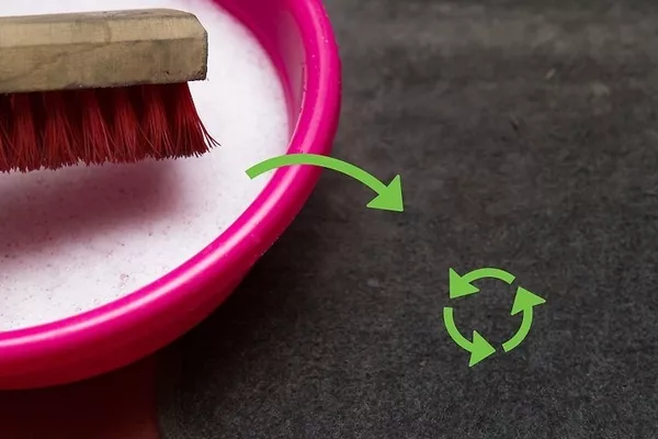 old stiff plastic brush for the car's floor mats