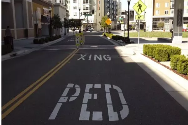 Some Ped Xing signs are painted onto roads like this one A picture of Ped Xing road signage.