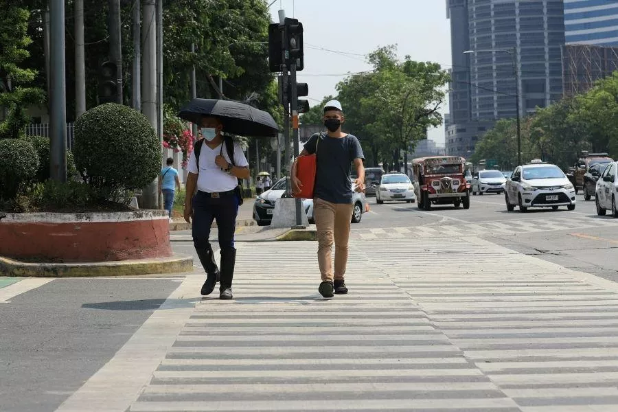 That said, what kind of a-hole cuts off a pedestrian? A picture of people using a pedestrian crosswalk