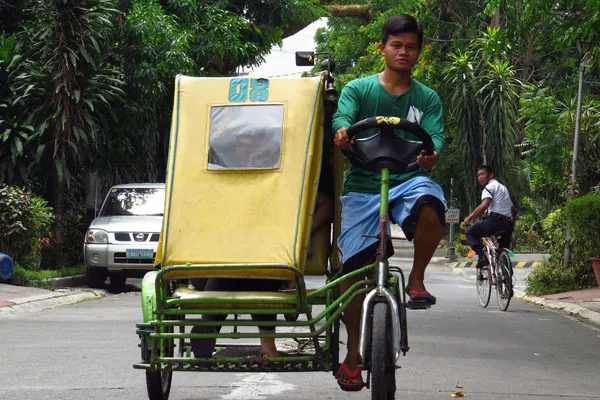 pedicab driver on the job
