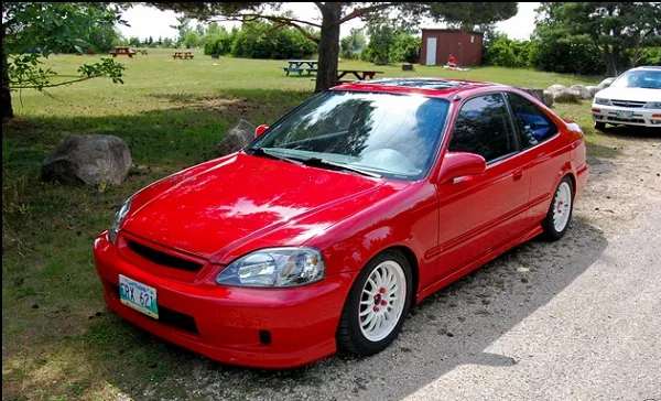 A picture of an orange Honda Civic SiR 1999
