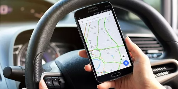 Utilize your GPS to find agreeable stops on the road every two-hours Man using GPS
