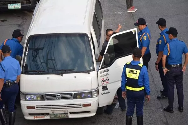 colurum vehicles being inspected by the MMDA
