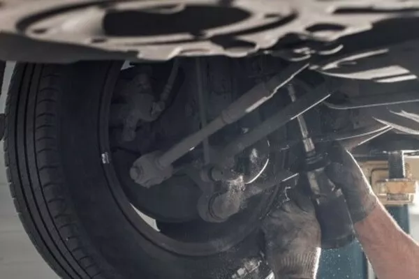 Mechanic checking for steering problem