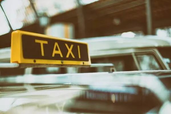 Tell your kids to hail a cab or a taxi in order to go home safely A taxi