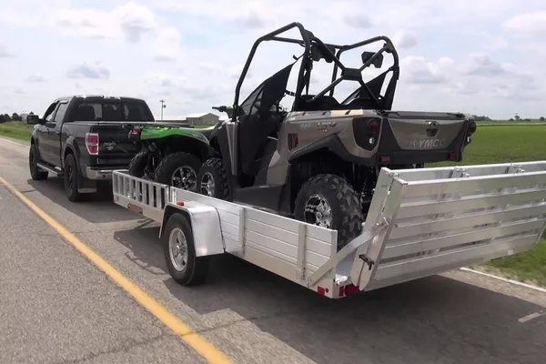 car towing a trailer
