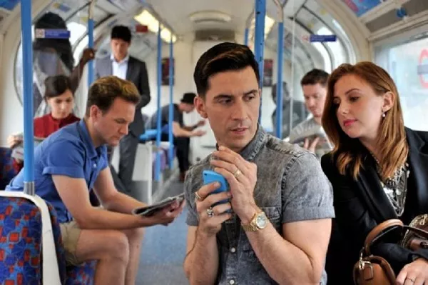 Some passengers love to read the text messages of the person beside them watching other phone on bus