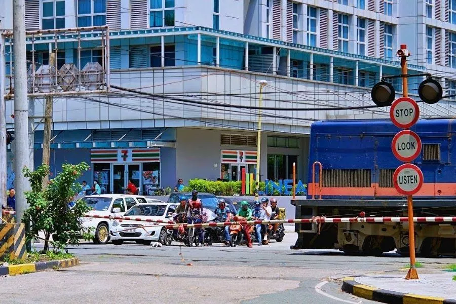 A picture of a railway crossing in the Philippines