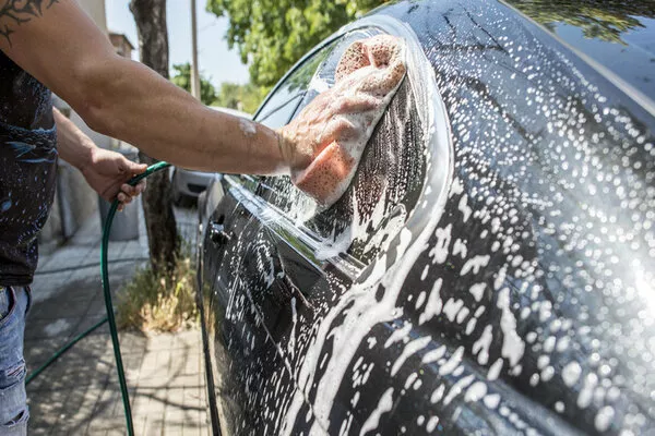Man cleaning the car