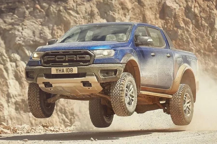 A picture of a Ford Ranger Raptor mid-jump