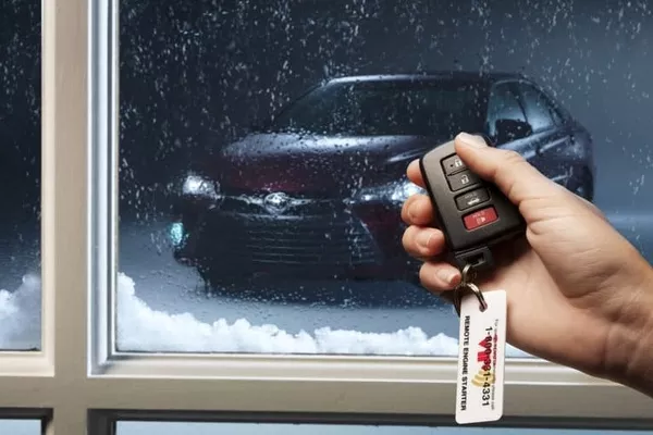 Man using a car remote starter