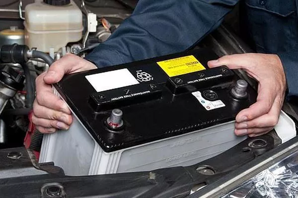 Removing the battery from car preserves it and makes its life last longer battery being removed from car