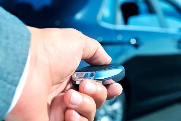 If the programs from these two devices no longer match each other, you will need to have it reprogrammed Man holding a car key fob