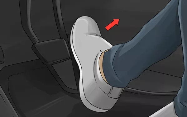 Take your right foot off the brake pedal Take your right foot off the brake pedal