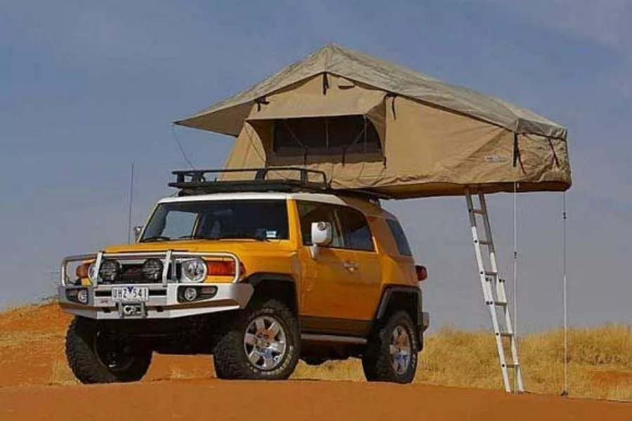 A picture of an FJ Cruiser with an ARB tent kit.