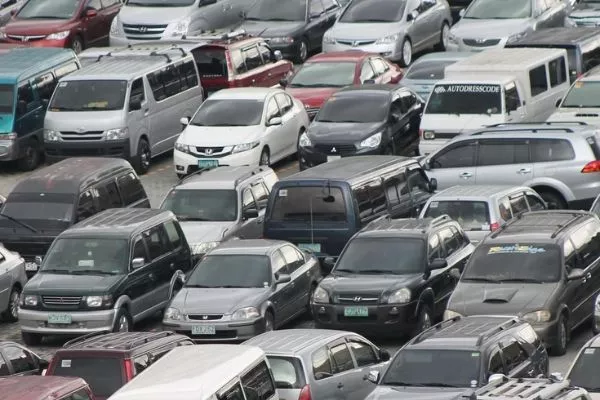 Cars packed like sardines on a parking lot