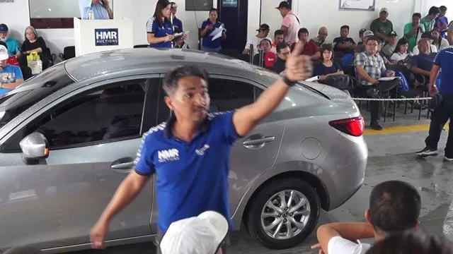 A picture of a car auction in the Philippines