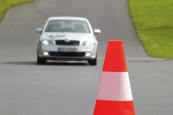 For first time drivers, it is encouraged not to drive on peak hours to reduce stress. a car on the road