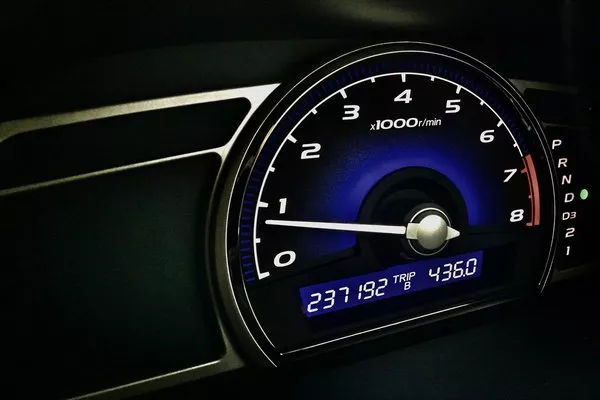 A digital mileage on a car