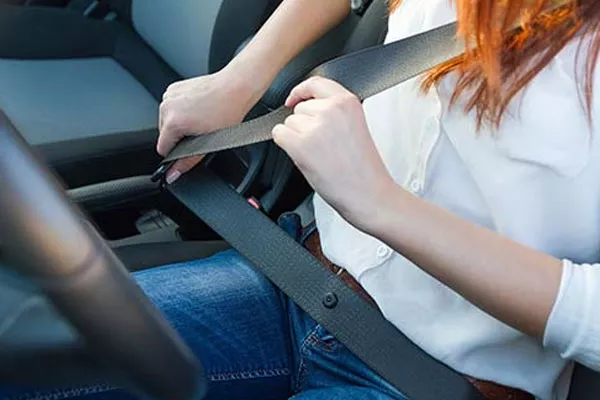 Woman wearing seat belt