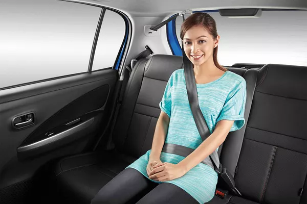 Woman wearing seatbelts