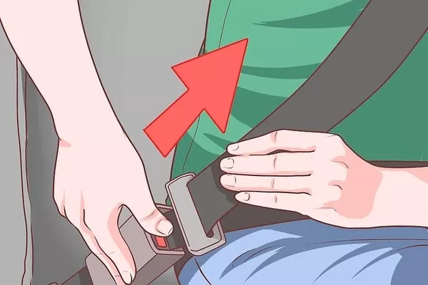 man removing seatbelt