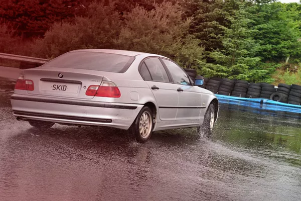 car running in the rain