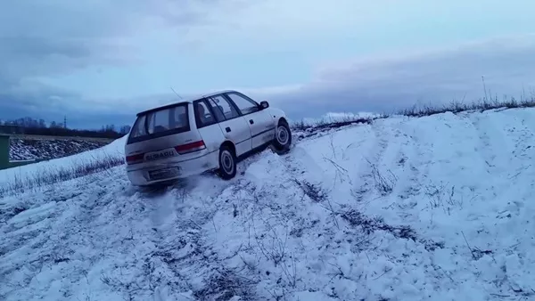 Skidding car on snow