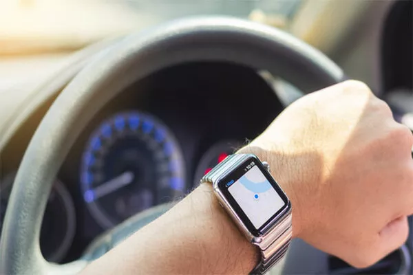 If you have the option to choose which time you would prefer driving, choose the time when you are most energetic Man looking at his watch