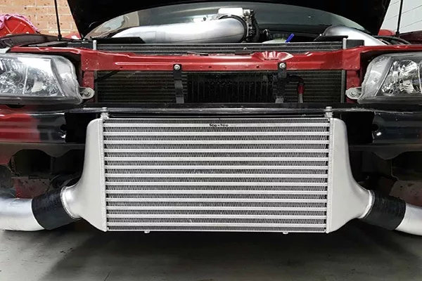 A picture of a car with its intercooler exposed