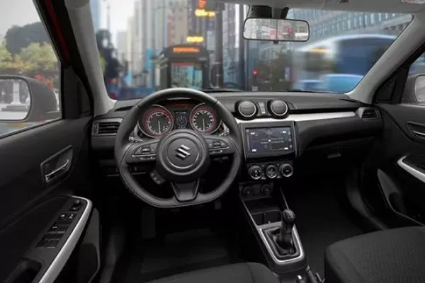 The interior of the Swift isn't much, but it's well arranged and comfortable A picture of the Suzuki Swift's interior