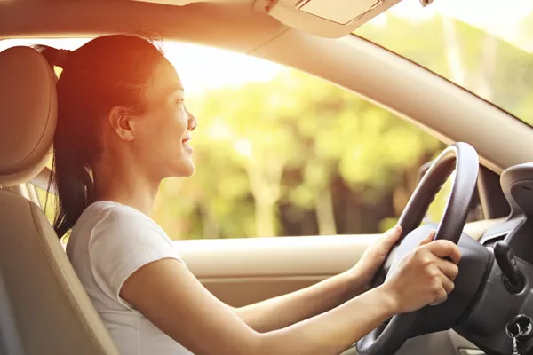 a wonan driving a car