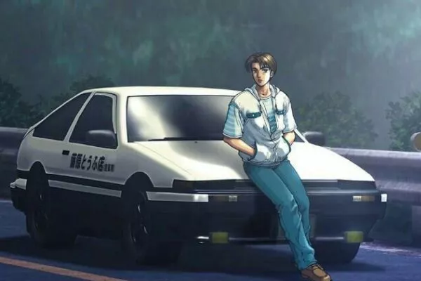 A picture of Takumi and his Toyota AE6 on a mountain road