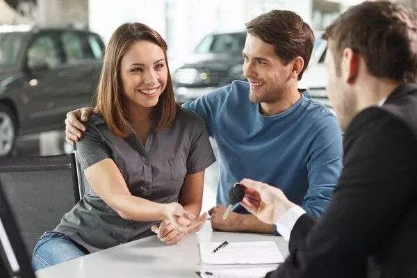 A couple buying a car