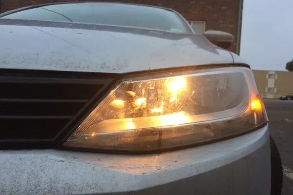 Car with headlight on