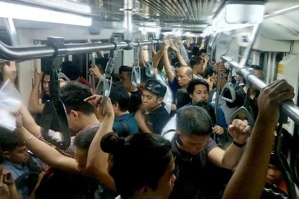 A picture of a crowded MRT