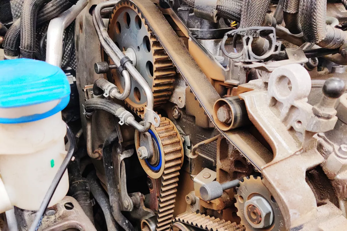 Rusty timing belt in an engine bay