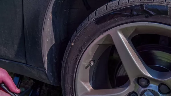 When the edges on the inside and outer edges are worn; but not in the middle of the tire flat car tire