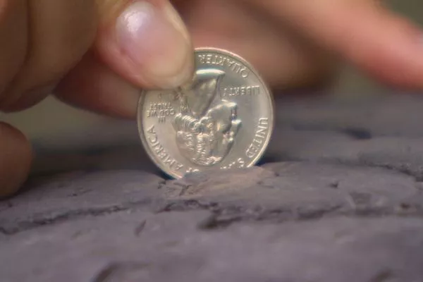 A picture of a tire coin test