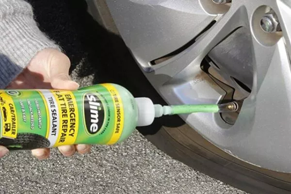 A picture of a tire sealant being applied