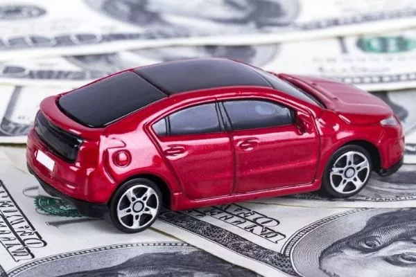 toy-car-on-top-of-money