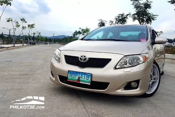 A picture of a modded 2010 Toyota Altis parked on a road