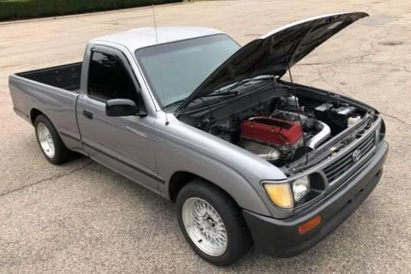 It looks like any ordinary Hilux on the road until you look under the hood A picture of the K20 swapped Toyota Hilux