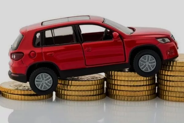 Toy car in coin stack