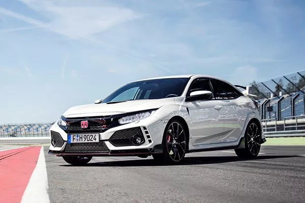 A picture of a Civic Type R on a racetrack.
