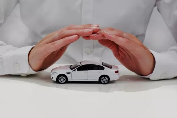 Man covering the car